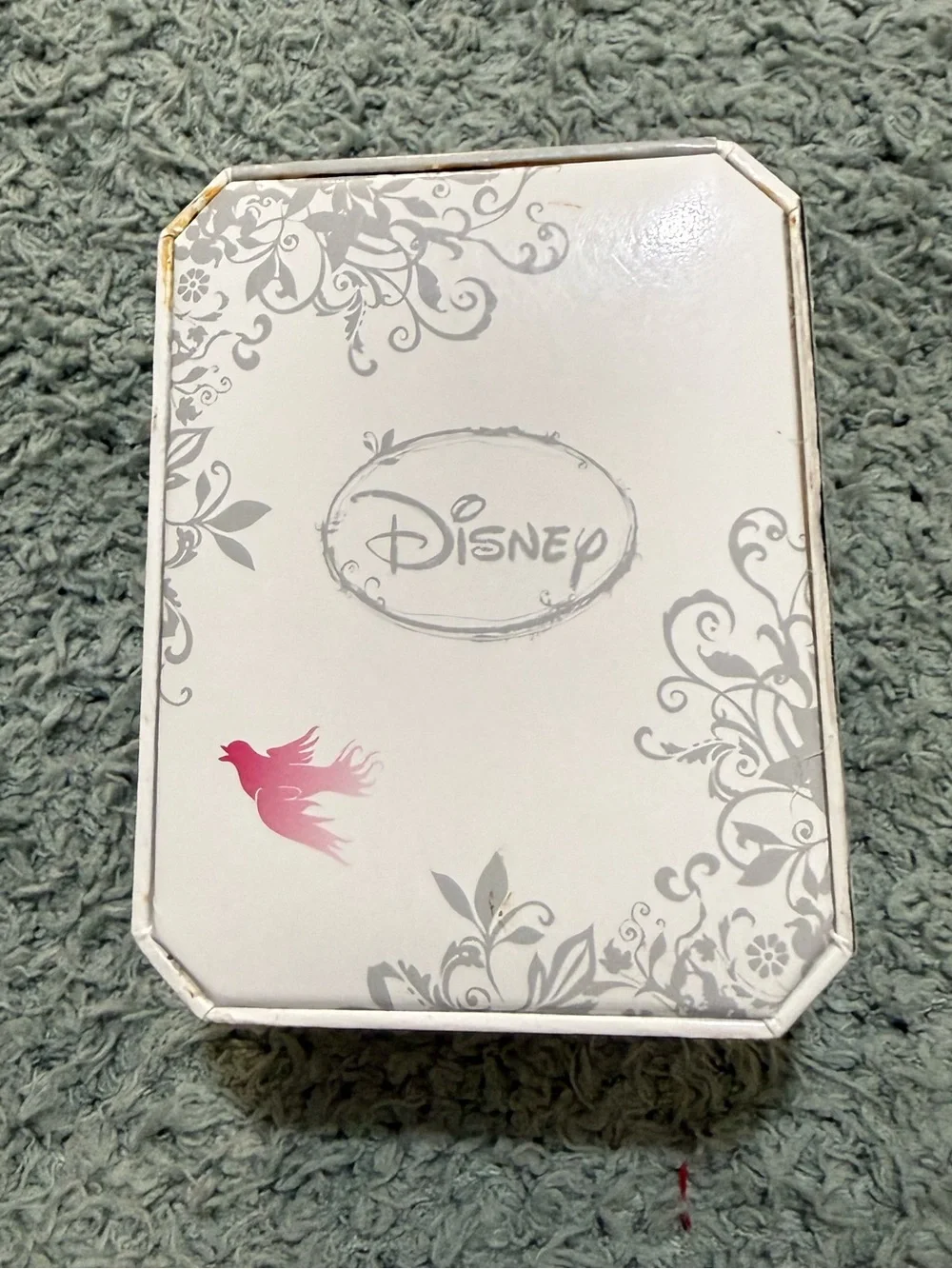 Disney Winnie the Pooh watch features a crystal-bezel dial and dangling charms o